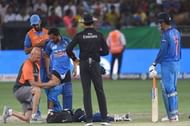 Kedar Jadhav receiving treatment after pulling his hamstring